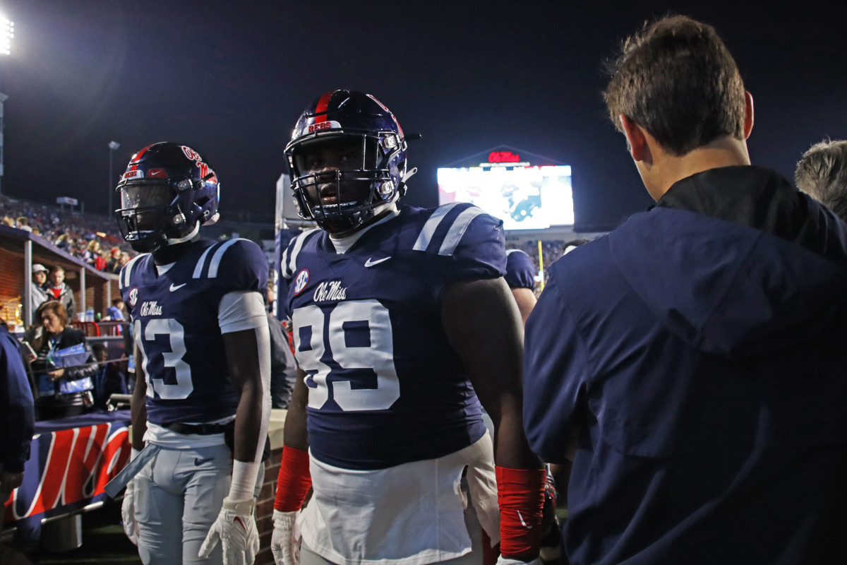 Ole Miss Rebels defensive lineman JJ Pegues exits the field after beating the Georgia Tech Yellow Jackets 48-23 in Week 3 (2023). 